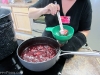 Carol Ann Susi demonstrates canning plum preserves