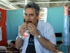 Licking and biting the Ginger Wipeout ice cream sandwich at Beachy Cream