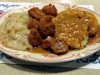 Fried sweetbreads with cabbage and Czech dumplings