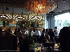 Chaya's bar area featuring a chandelier of found objects