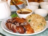 Roasted turkey with brown turkey sauce and rice