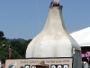 A Foster Farms chicken avoids a flaming garlic bulb