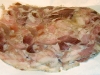 Coarsely chopped head cheese slices ready to eat