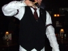 A bartender prepares a Spanish coffee