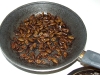 Silkworm pupae (beondegi) in the frying pan