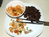 A delicious meal of silkworm pupae, kimchi and snack crackers with dead fish