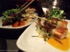 Pork belly and scallop (front) and marinated mignon galbi skewers