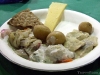 Herring plate featuring three preparations and Västerbotten cheese