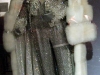 A rhinestone and mink outfit that match a car and piano