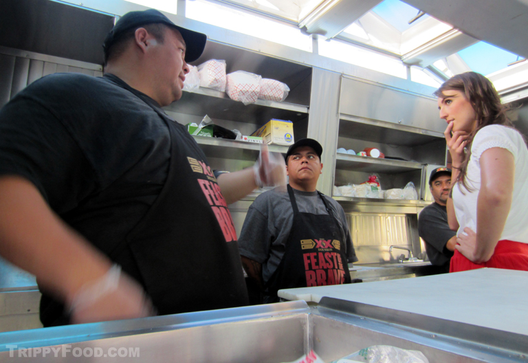 Don Chow chef owner Dominic Lau discusses tacos with a rep from Dos Equis