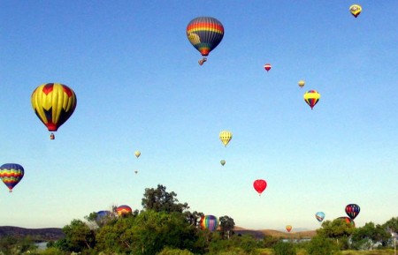 The morning sky filled with balloons