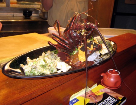 Lobster sashimi is served while the lobster watches