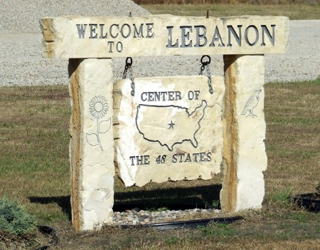 One of many signs indicating the center of the country