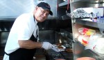 Bill Kelley slaving over a hot BBQ truck