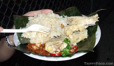 Hainanese chicken rice served on banana leaf