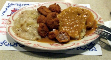 Fried sweetbreads with cabbage and Czech dumplings