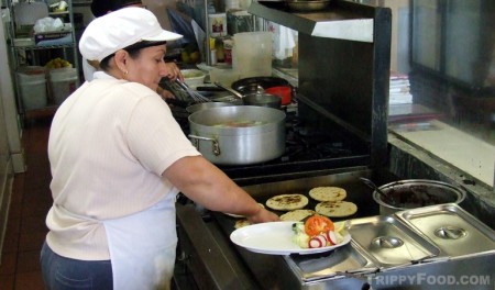 Our chef prepares pupusas at La Nueva Flor Blanca