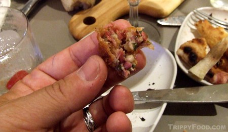 The porky bits inside the fried head cheese