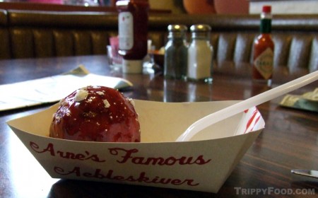 A freshly made jam-coated æbleskiver from Solvang Restaurant