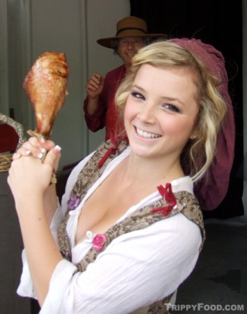 A young server up at bat at the turkey leg stand