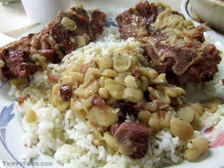 Lima beans and pork neck and tails over rice