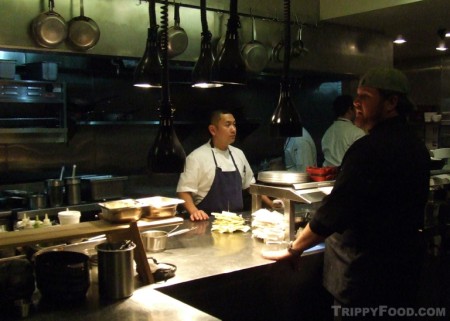 Chef David LeFevre (in black) manages the kitchen