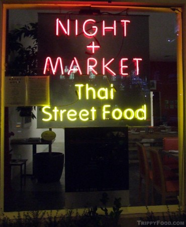 A simple neon sign heralds the Night+Market