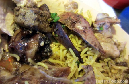 Bits of eye, brain and tongue mingle with savory lamb meat and rice