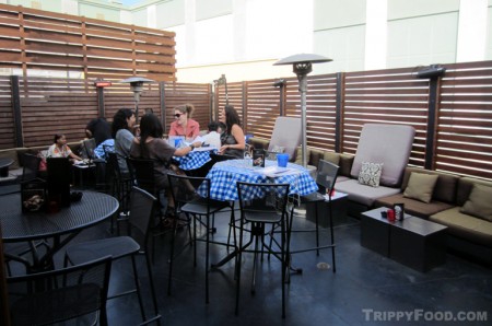 The upstairs patio, one of the rooms serving the summer clambake