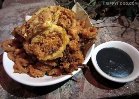 Rice-coated calamari with a squid ink aioli