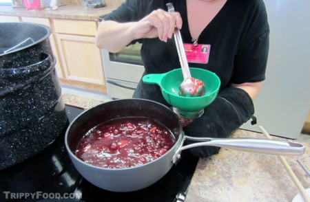 Carol Ann Susi demonstrates canning plum preserves