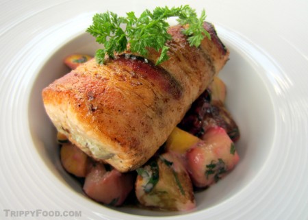 Bacon-wrapped salmon with beets and gnocchi