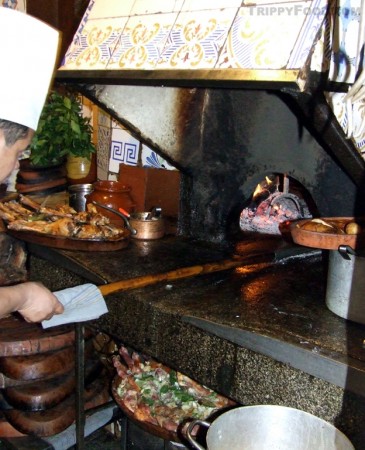 Roasting suckling pig in the original 1725 oven