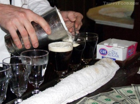 Topping off the Irish coffee with cream