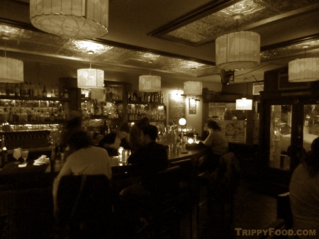 Tin ceiling and paper shades give The Victory Bar a vintage look