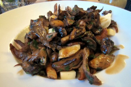Hachoir's "The" poutine with duck confit, Grosse-Île tomme and mushrooms