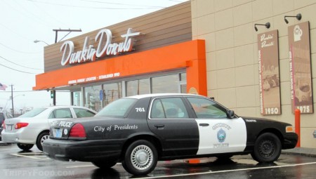 A cop car in front of the original DD in Quincy MA