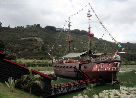A cement scale model of the Brig Admiral Padilla in a tiny Caribbean Sea