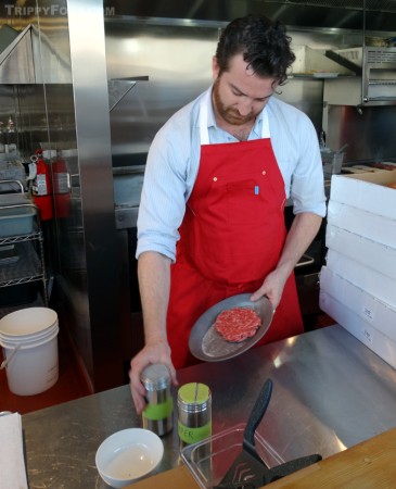 Chef Christian Page prepares a classic Cassell's burger